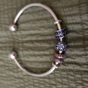 Pandora bangle with five charms